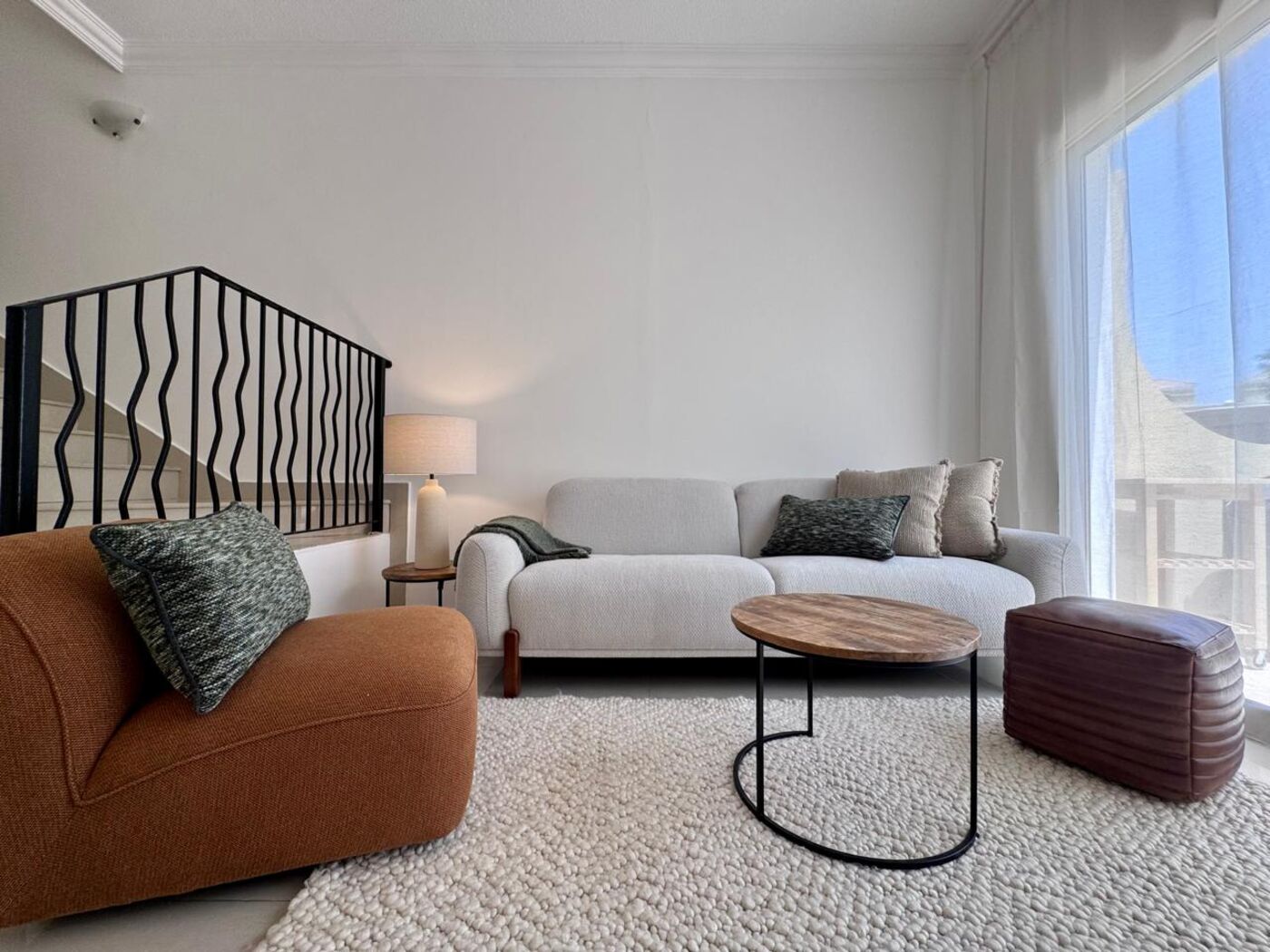 A furnished living room in a Ras Al Khaimah villa